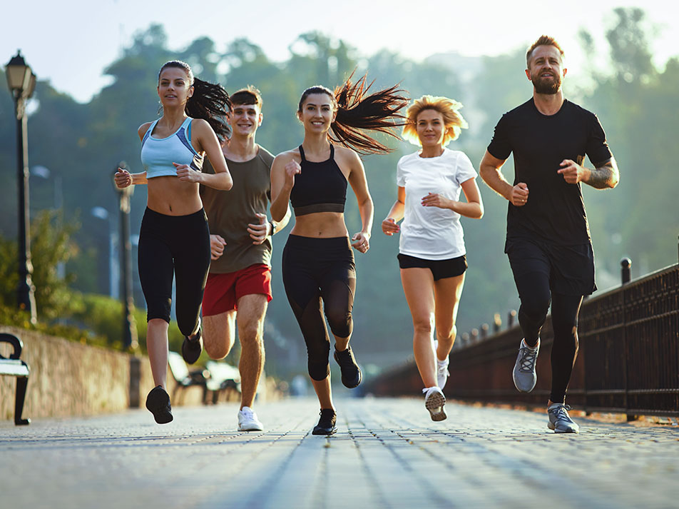 Active adults running outdoors